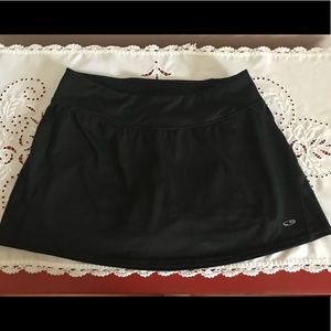 Champion golf/tennis or just running black skort.